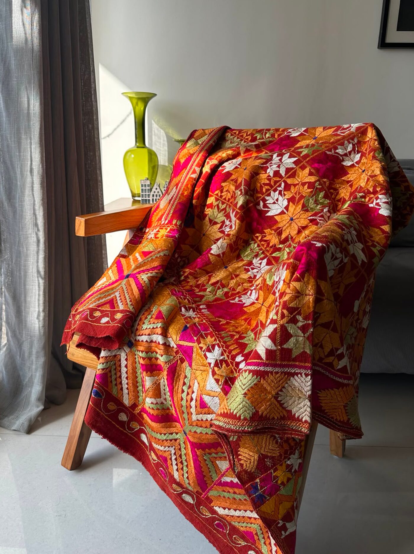 A hand-embroidered phulkari textile, source of Thath's motifs